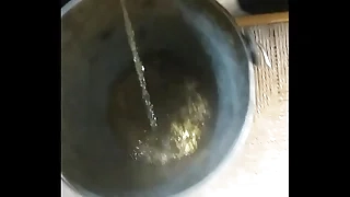 Peeing regarding a bucket