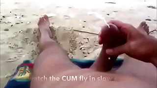 Curved bushwa wank and cum at unclad beach