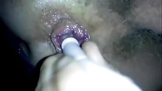 candle inserted connected with ass while peeing connected with thermos