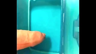 Peeing playing with the piss and cum